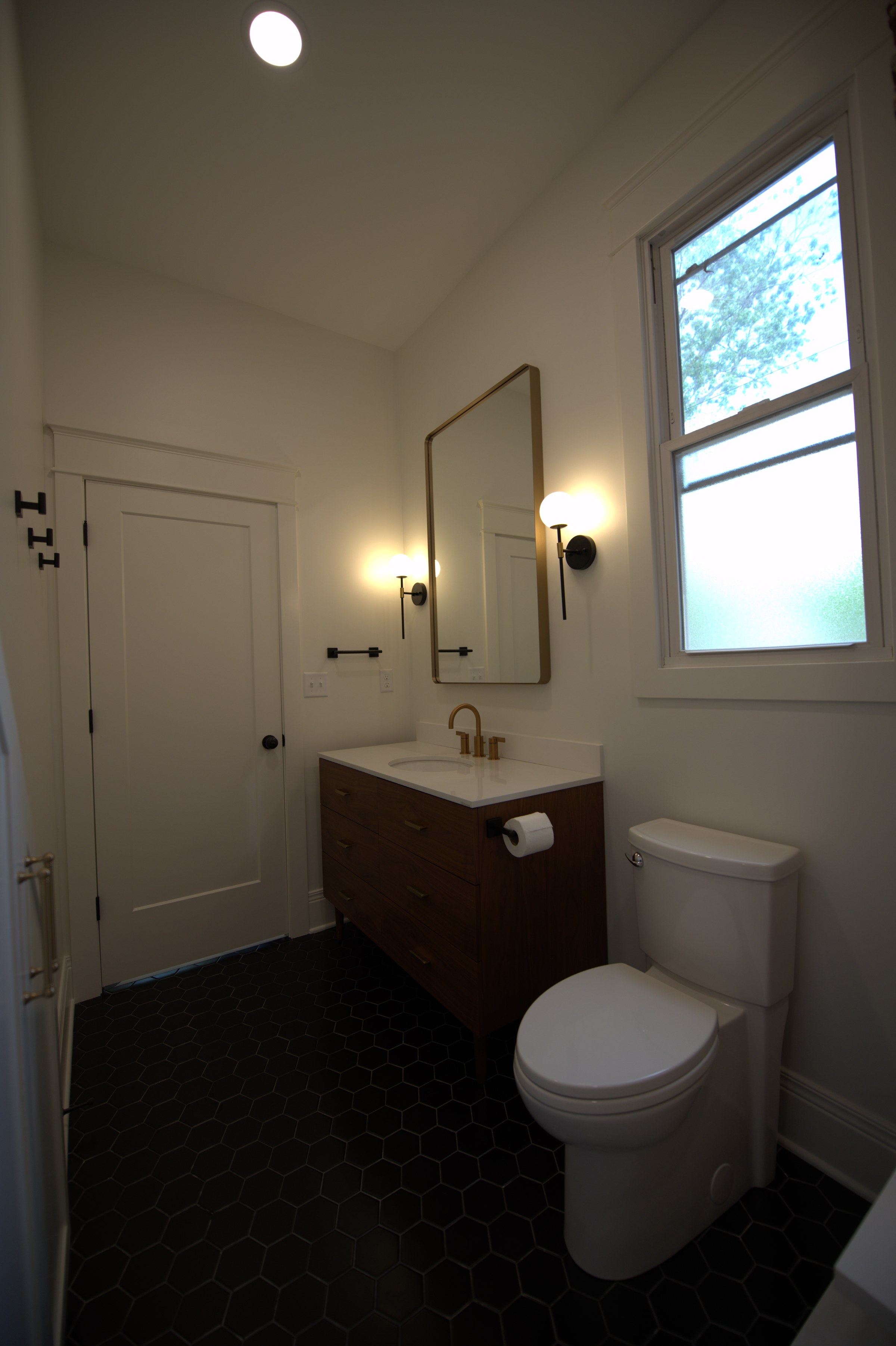 Powder room toilet and window